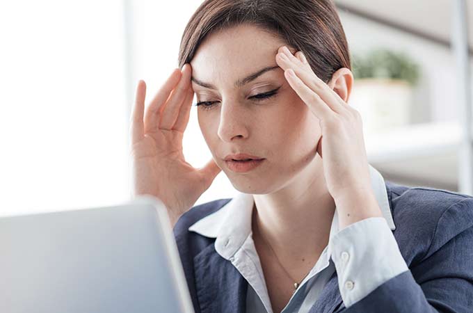 Worker seeking headache relief clinic